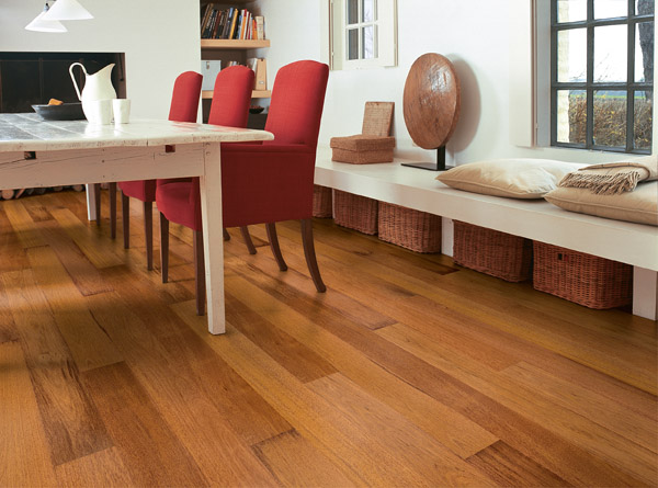 What is the difference between hardwood flooring and laminate flooring